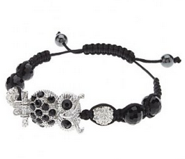 Bracelet fantaisie orne d'un hiboux recouvert de crystaux