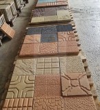 Machine pour production des carreaux a beton