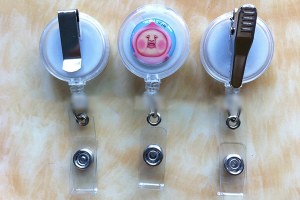 Transparent plastic badge reel