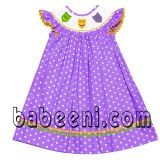 Smocked bishop dress with mardi gras masks