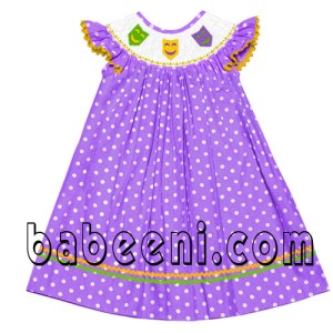 Smocked bishop dress with mardi gras masks