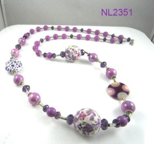 Collier perles mauves