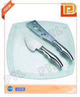 Stainless steel cheese knife with streamlined handle plus square glass cutting board(2 pieces)