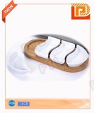 Lovely streamlined ceramic food holder with wooden stand