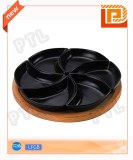 Black ceramic food holder in windmill shape