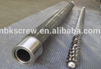 Screw and barrel for rubber processing machinery