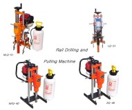 Rail drilling and pulling machine