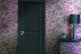 Wood plastic composite door